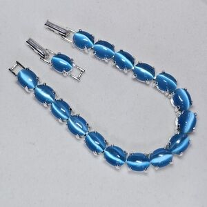 AVON Blue Catseye and Silver Bracelet